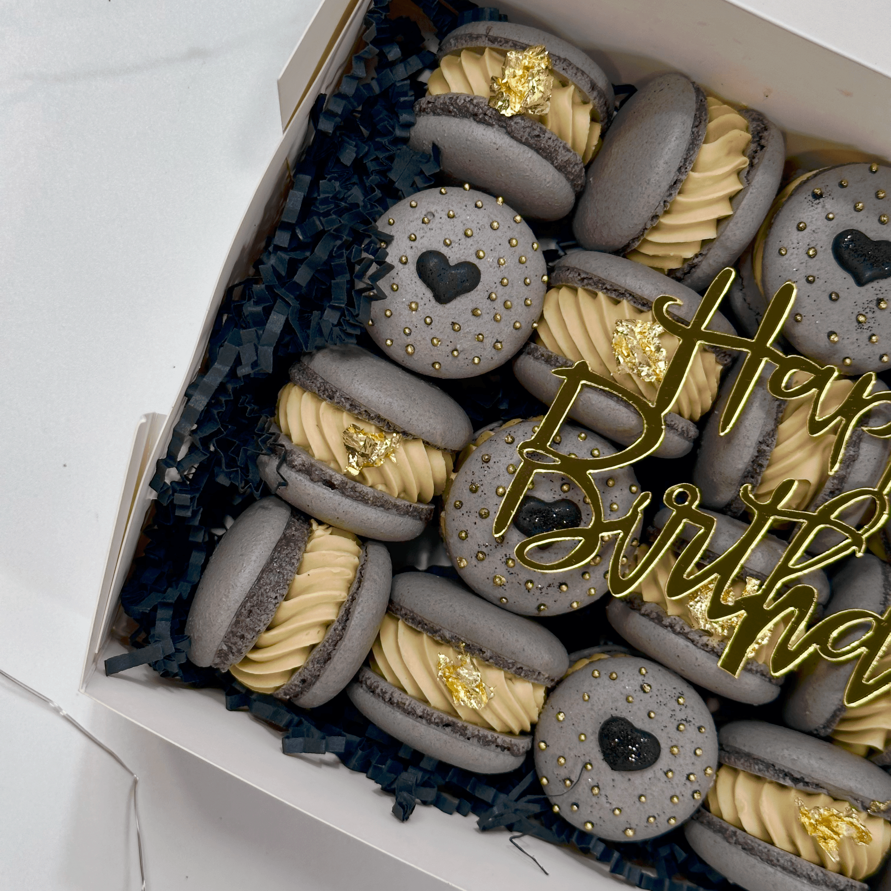 Luxurious gold-dusted macarons